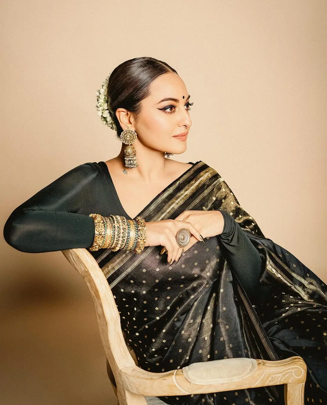 SONAKSHI SINHA WEARING BEAUTIFUL EARRINGS BANGLES BLACK SAREE